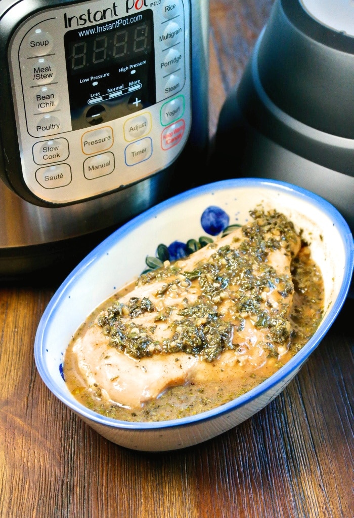 Raw chicken breast in marinade ready to be cooked in an air fryer. 