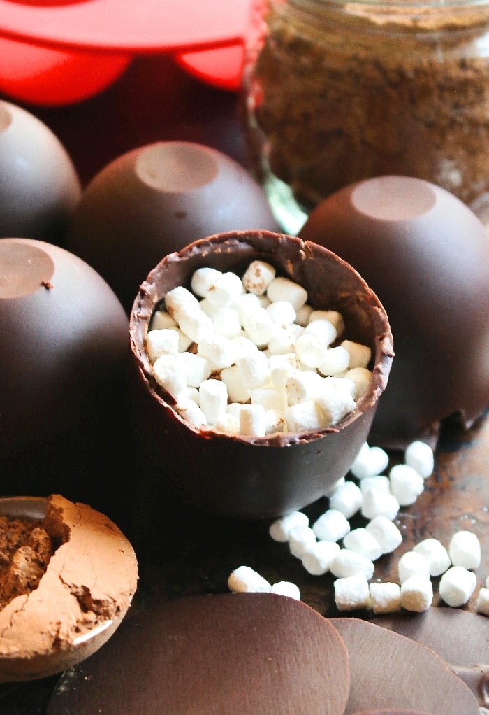 Cocoa and mini marshmallows in a cocoa bomb. 