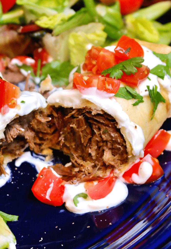 Close view of the inside of a beef chimichanga.
