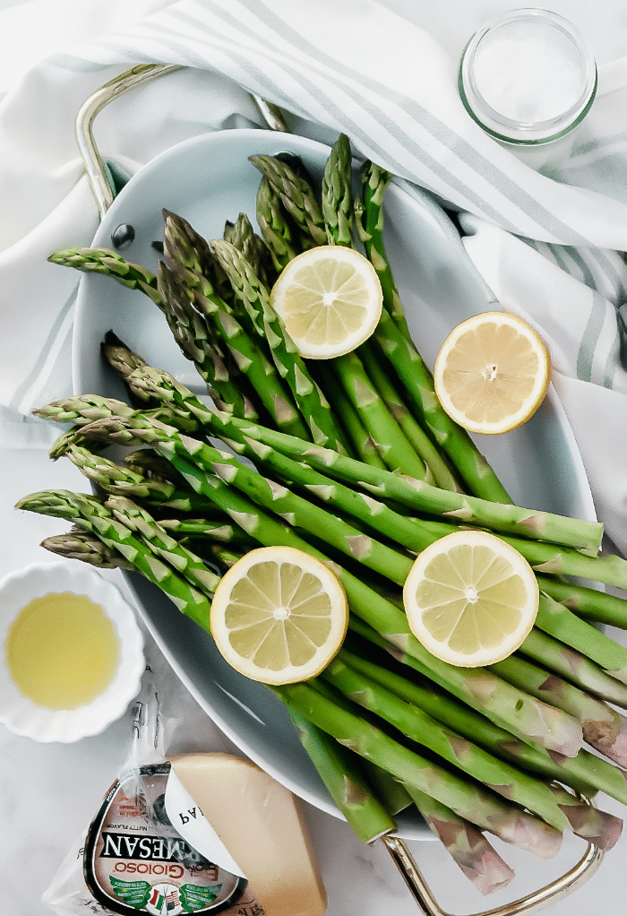 Fresh asparagus topped with lemon slices. 