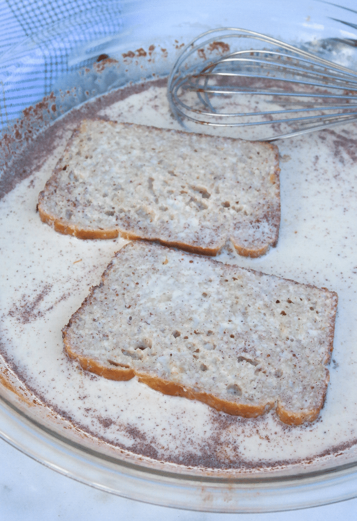 Here we dip the low carb banana bread in the French toast egg mix. 