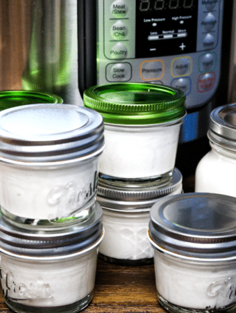 Small mason jars of homemade yogurt made in an Instant Pot
