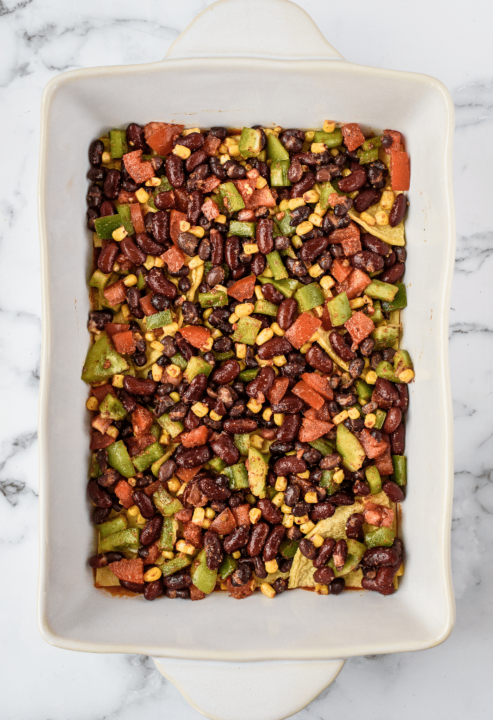 Vegetables go on top on the corn tortillas. 