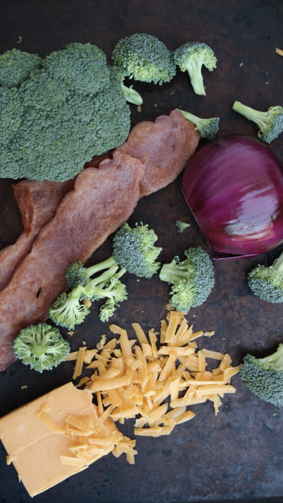 Ingredients needed to make broccoli salad.