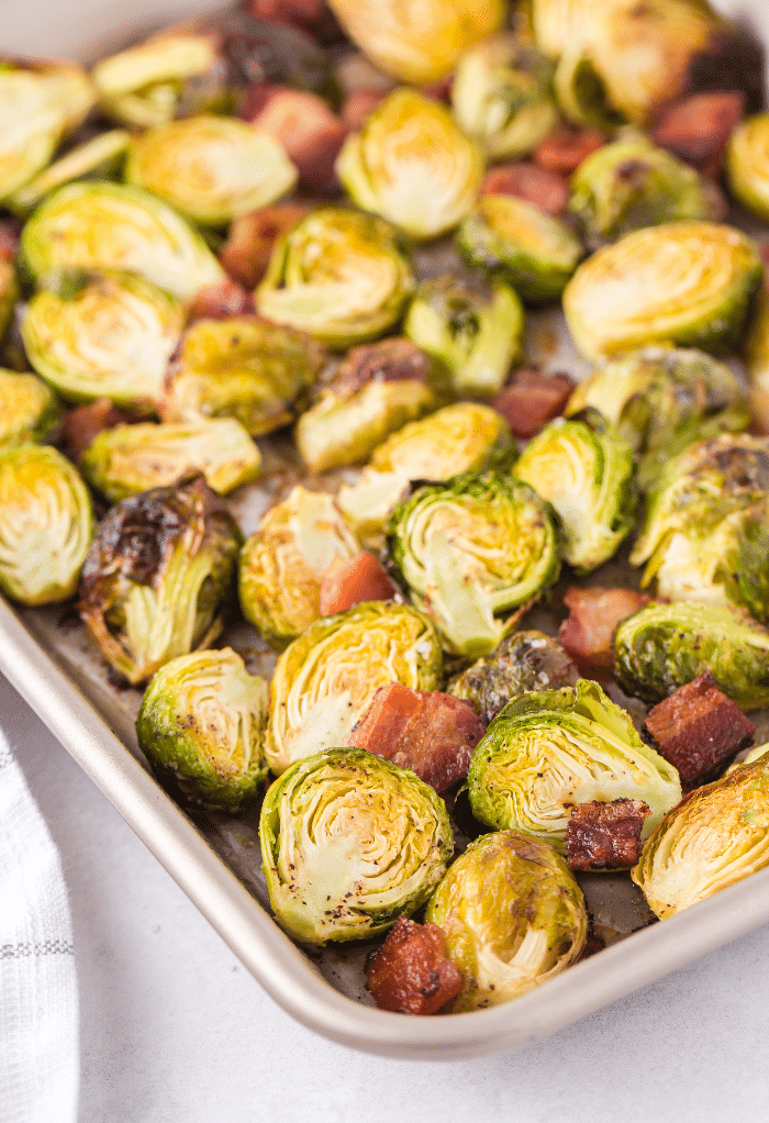 A baking tray of cooked keto Brussels sprouts. 