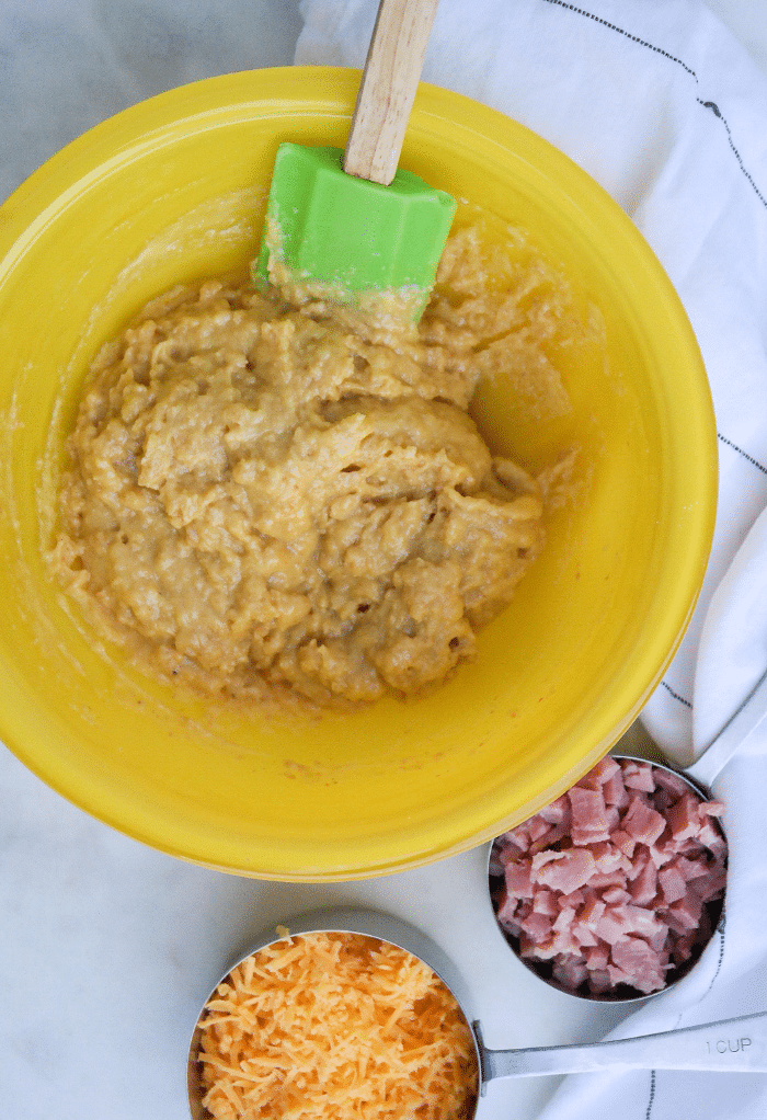 Muffin batter for low carb Batter with cheddar cheese and ham.