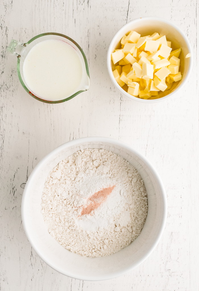 Dry ingredients with wet ingredients for homemade biscuits.