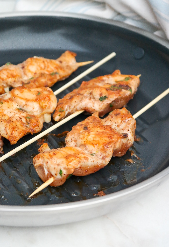 Cooking chicken in a non-stick skillet. 