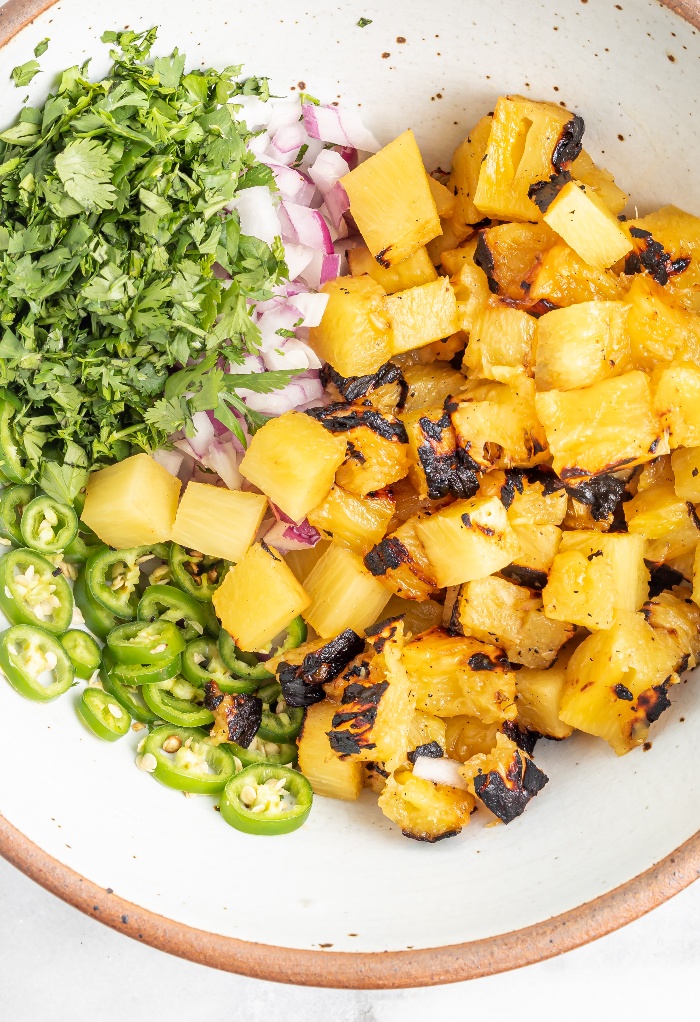 Fresh grilled pineapple diced and added to salsa ingredients.