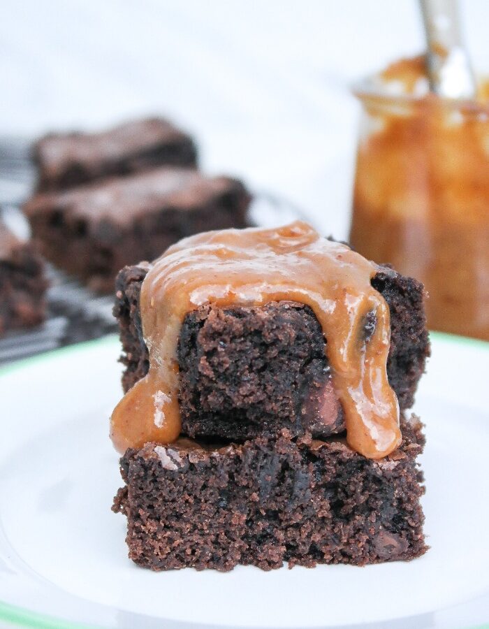 Peanut butter sauce over brownies.
