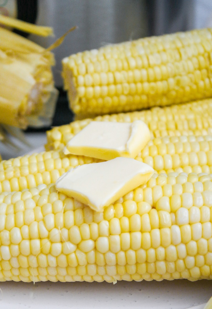 Instant Pot corn on the cob with butter on top.