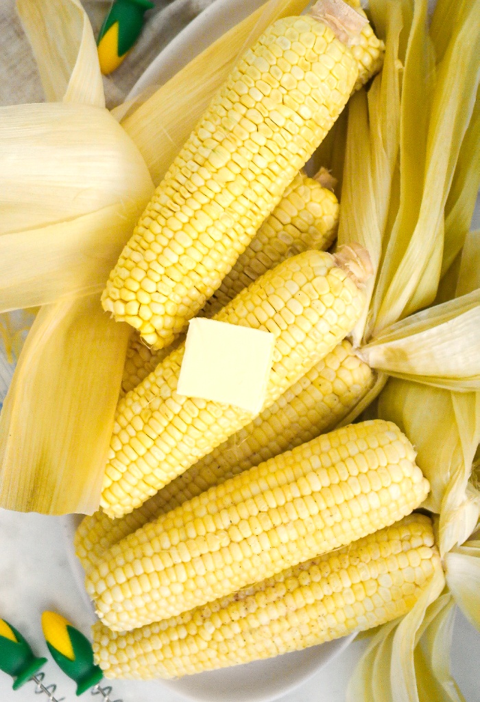 Tope view of corn on the cob on a platter.