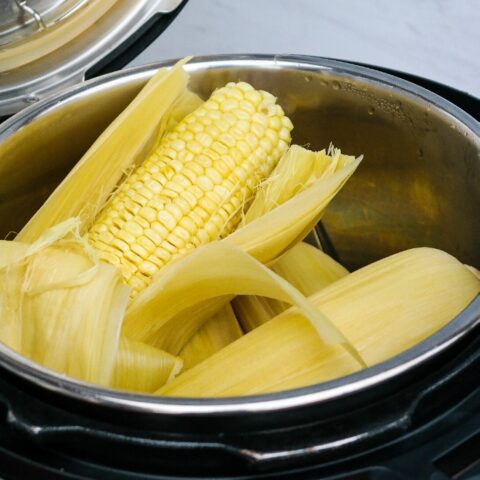 Cooked corn on the cob in a pressure cooker.