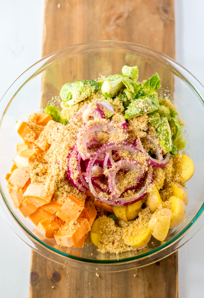 Seasoned vegetables in a clear bowl for one pan meal.