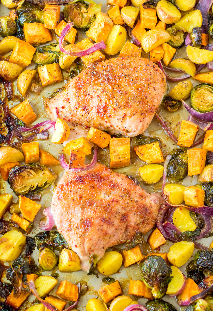 Roasted turkey and vegetables on a sheet pan.