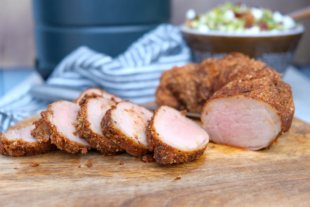 Air fryer pork tenderloin cooked and ready to eat. 