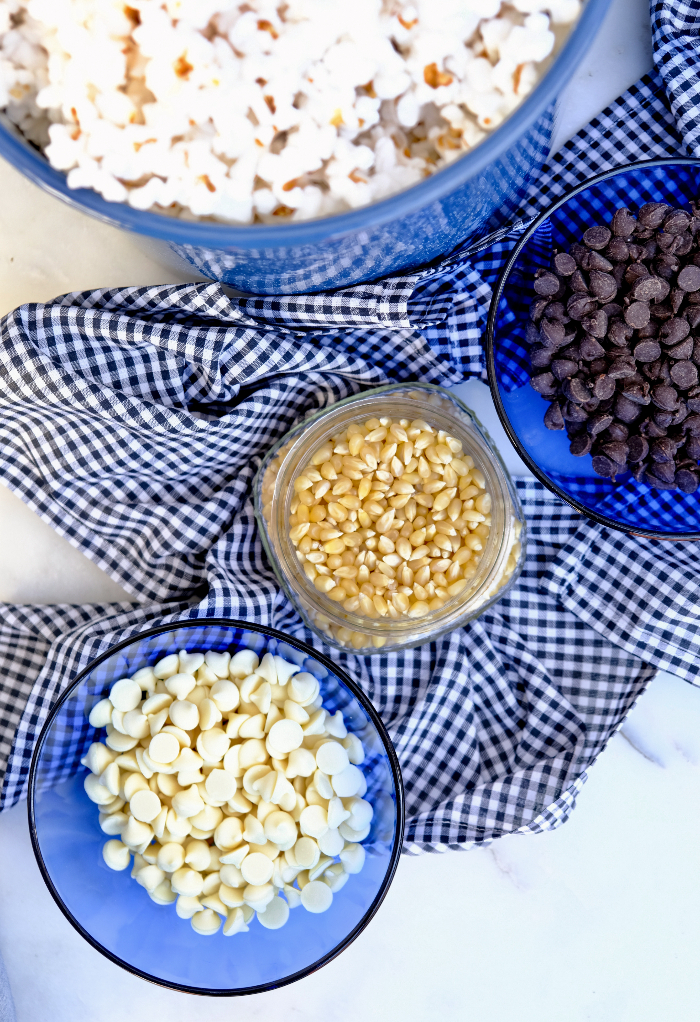 Ingredients to make popcorn drizzled with chocolate. 