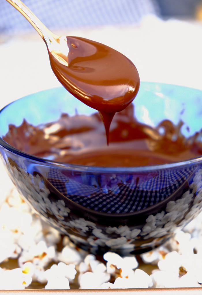 Melted semi-sweet chocolate dipped in a spoon.