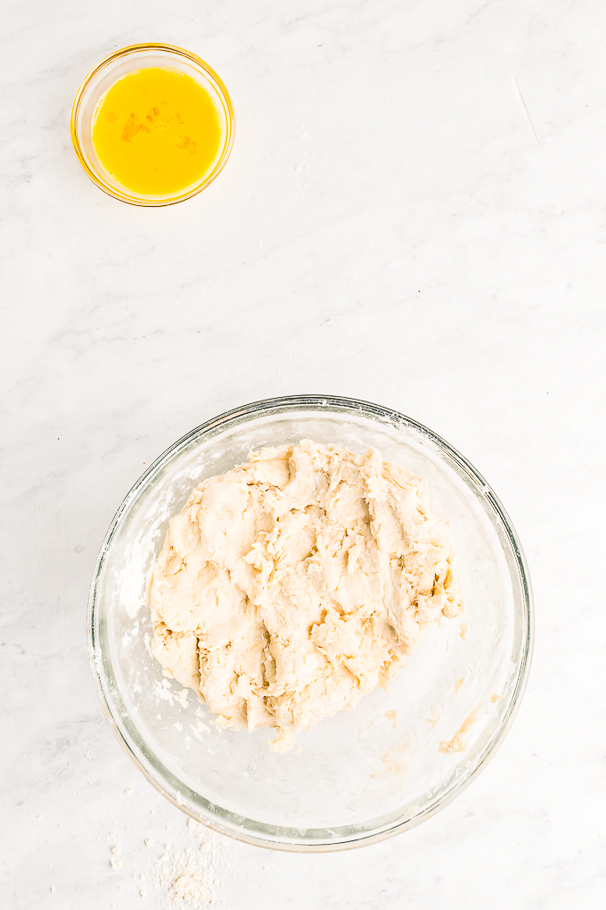 Pastry dough in a clear bowl ready.