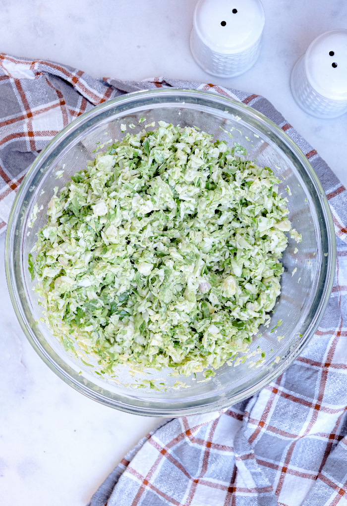 Shaved Brussel sprouts in a dijon lemon vinaigrette.