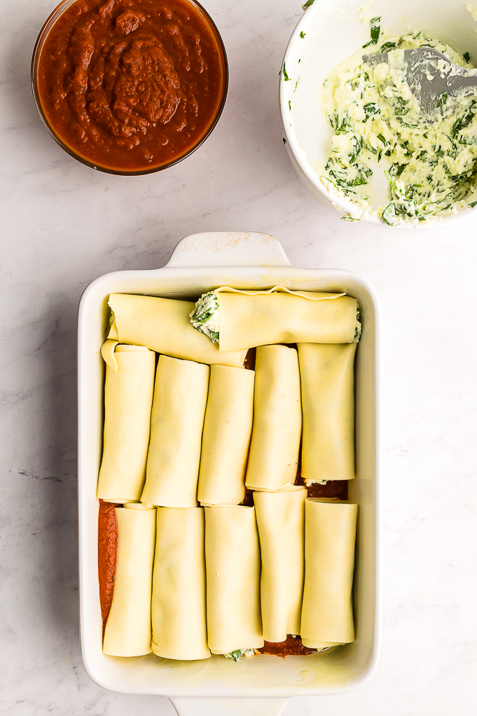 Manicotti in a casserole dish.