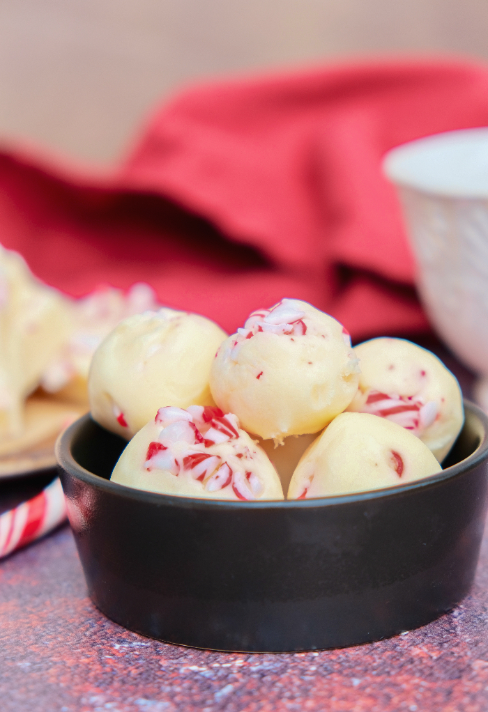 White chocolate fudge rolled into small round shapes.