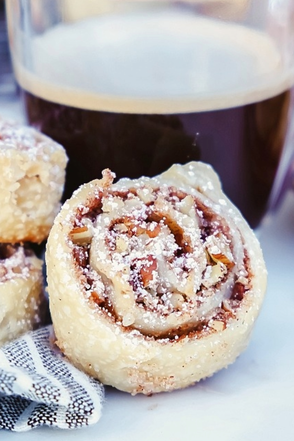 Pie Crust cookie with pecans with a cup of coffee.