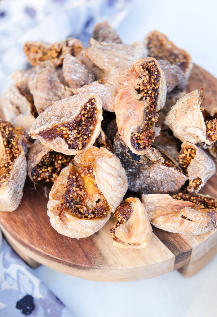 Dried figs sliced in half ready to cook. 