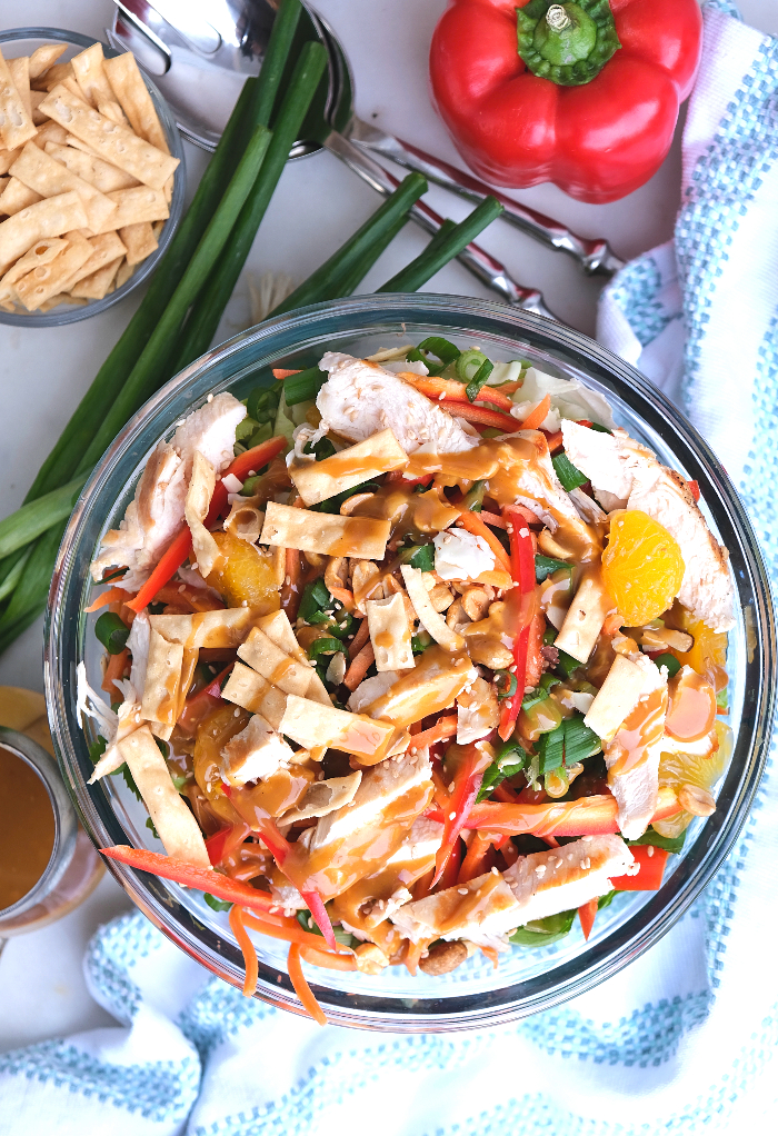 Top view of Chinese chicken salad in a large salad bowl. 