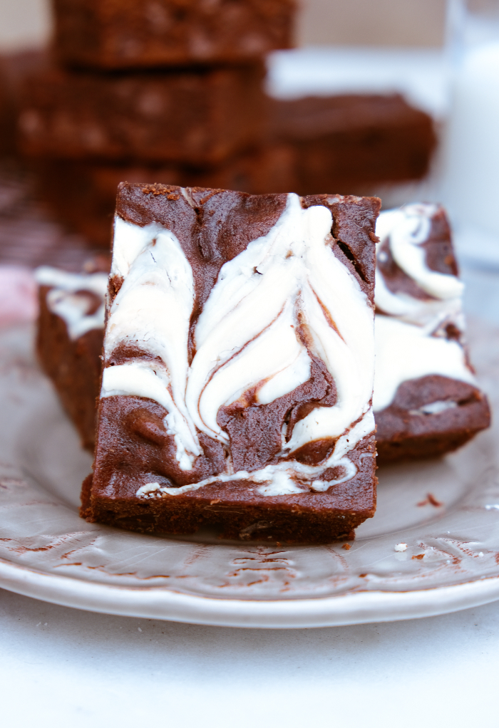 Brownies with a white chocolate swirl.