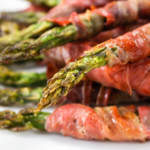 Fresh asparagus wrapped in prosciutto and baked until crispy.