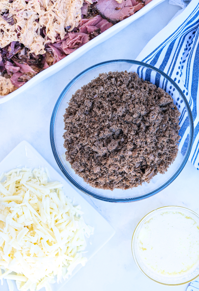 Rye bread crumbs in a clear bowl.