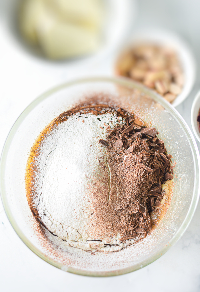 Dry ingredients in a mixing bowl to make homemade brownies. 