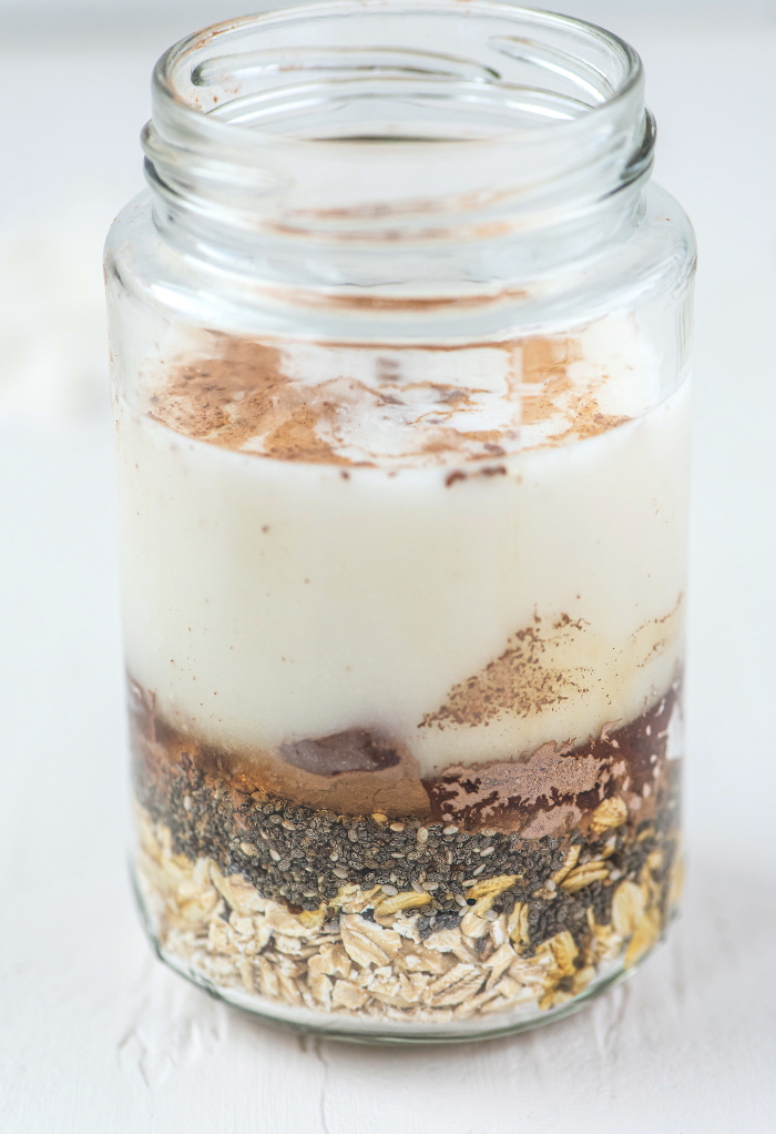 overnight oats in a large clear jar.