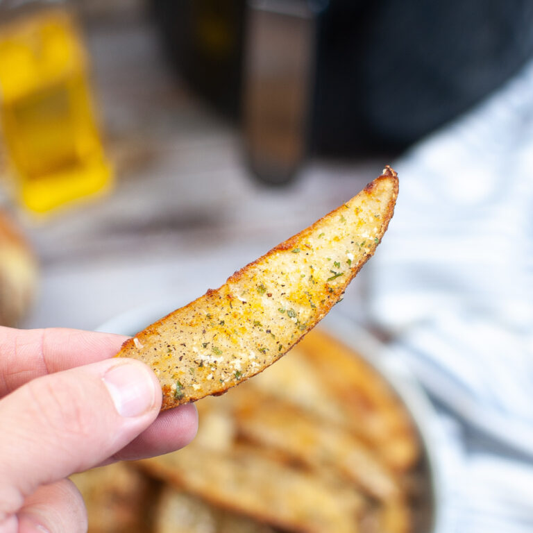 Potato wedge cooked in an air fryer.