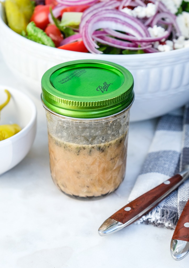 Greek salad dressing in a a mason jar. 