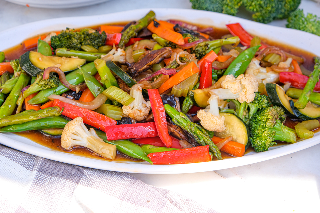 Stir fry on a white serving platter.
