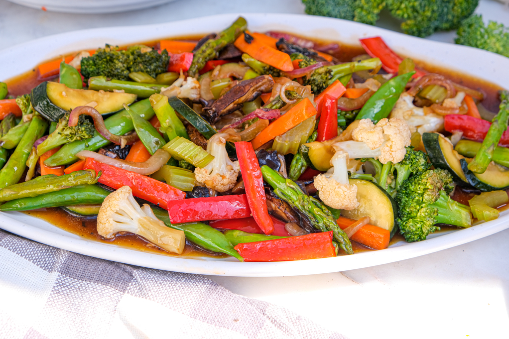 Stir fry on a white serving platter. 