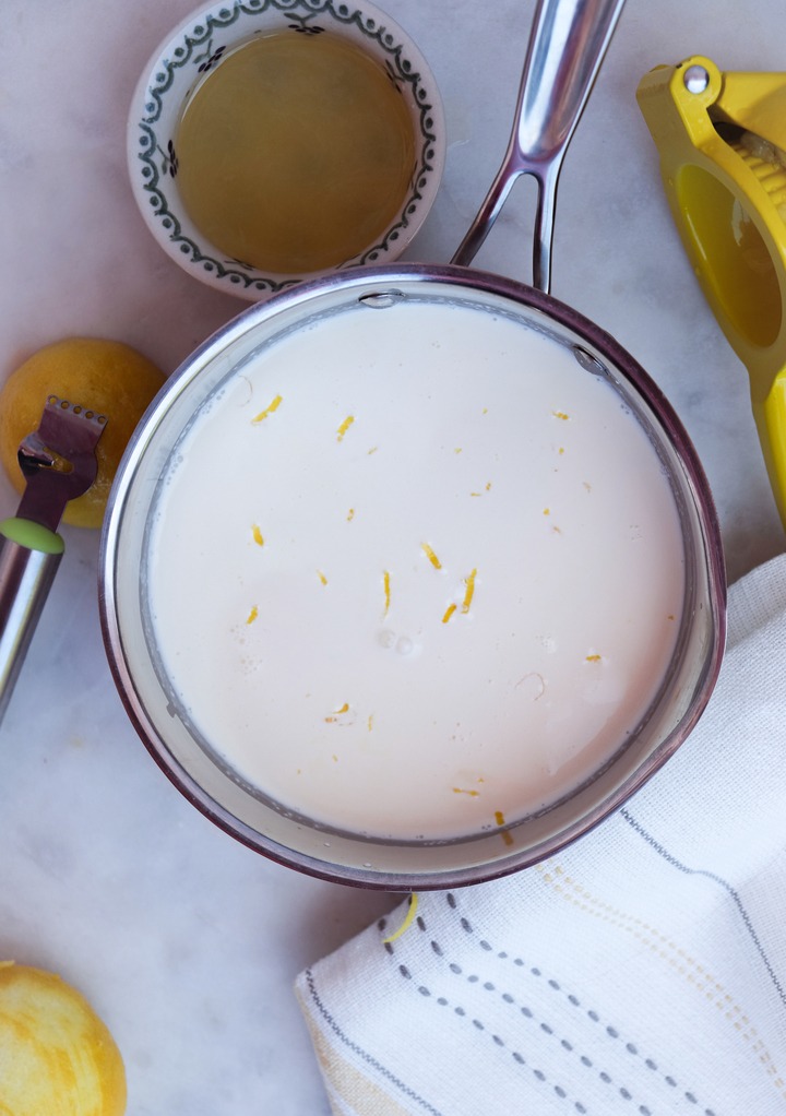 cream, sugar and lemon zest in a small saucepan before cooking. 