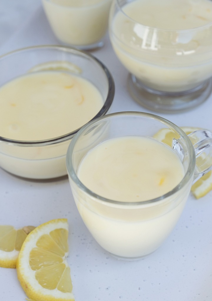 Lemon dessert in small glass dishes setting. 