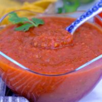 Homemade ranchero sauce in a clear bowl.