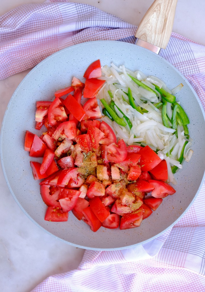 diced tomatoes, onions, jalapenos in a skillet.