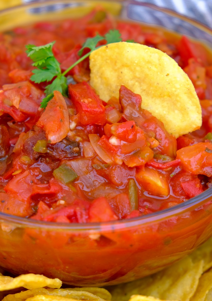 chunky homemade ranchero sauce in a clear bowl. 