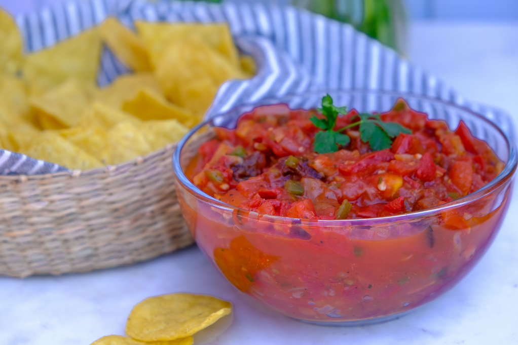 Chunky ranchero sauce used to dip tortilla chips. 