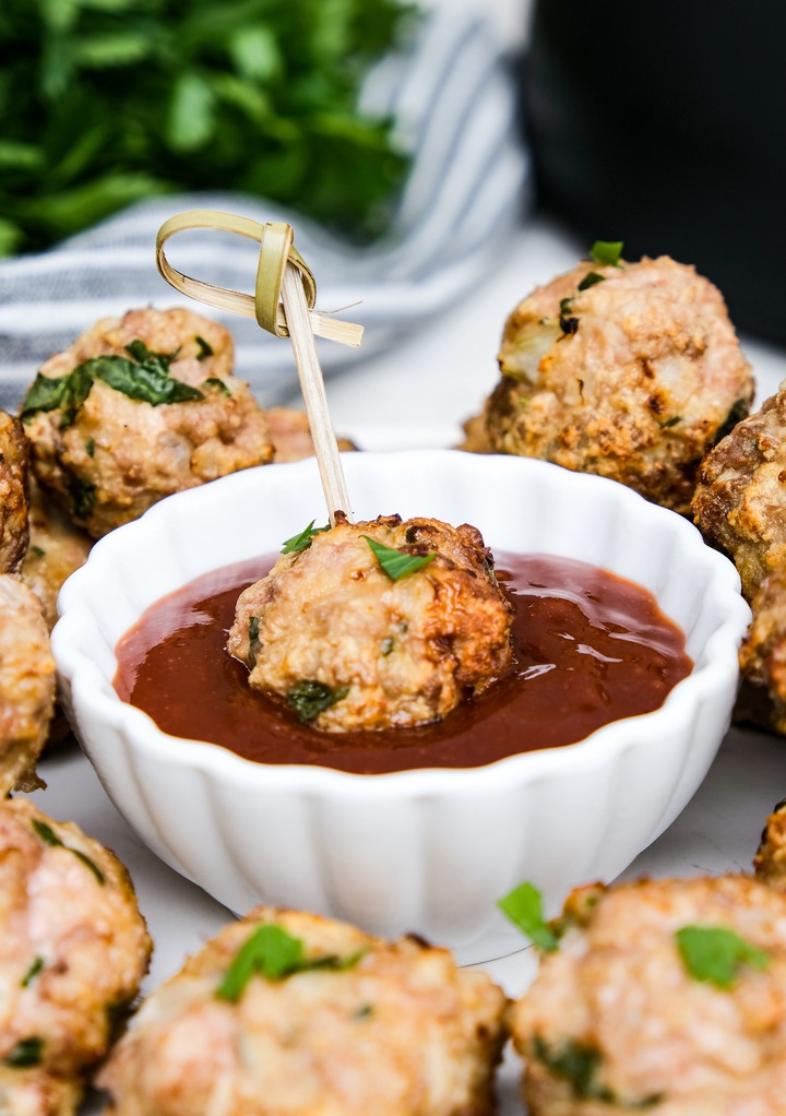 Cooked turkey meatball dipped in brown sugar glaze. 