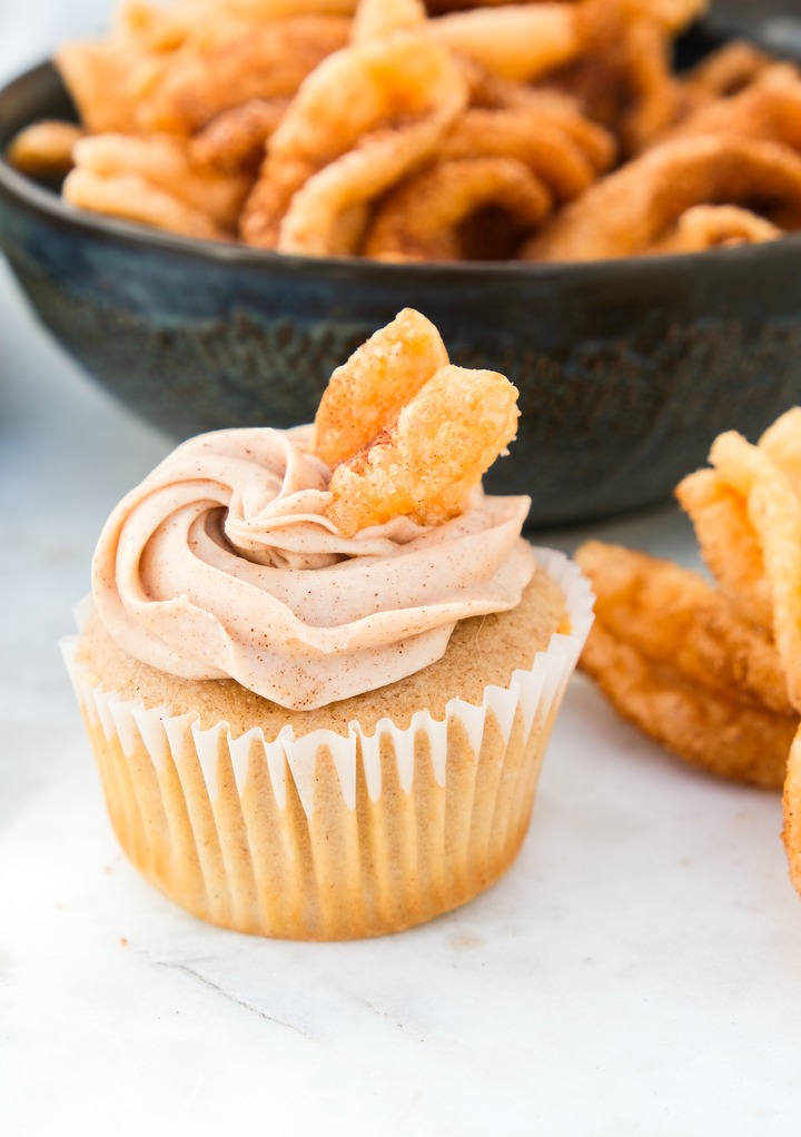 Homemade churro cupcake with cinnamon frosting.