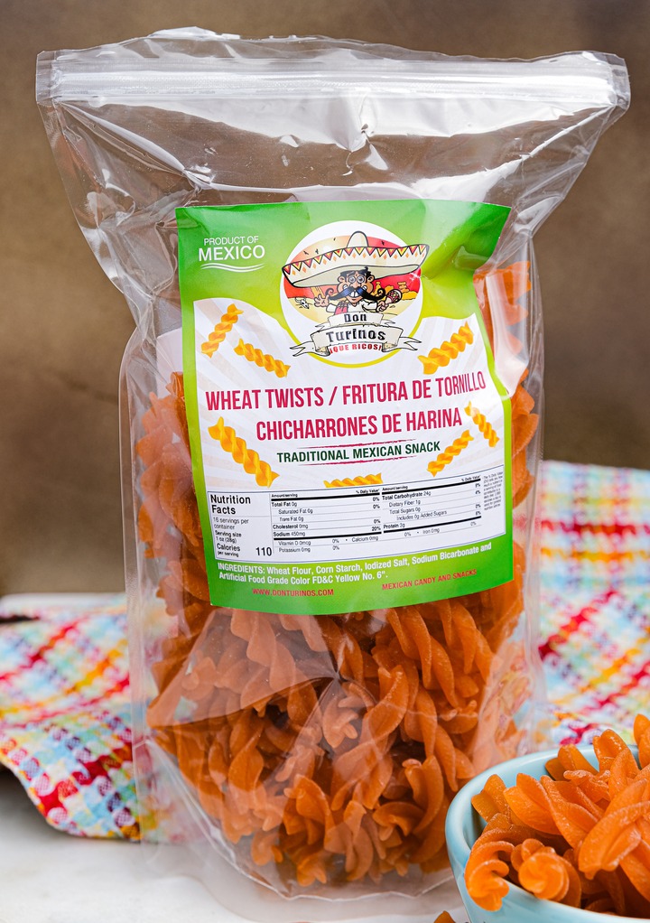 Wheat twists in a plastic bag before frying into cinnamon twists.