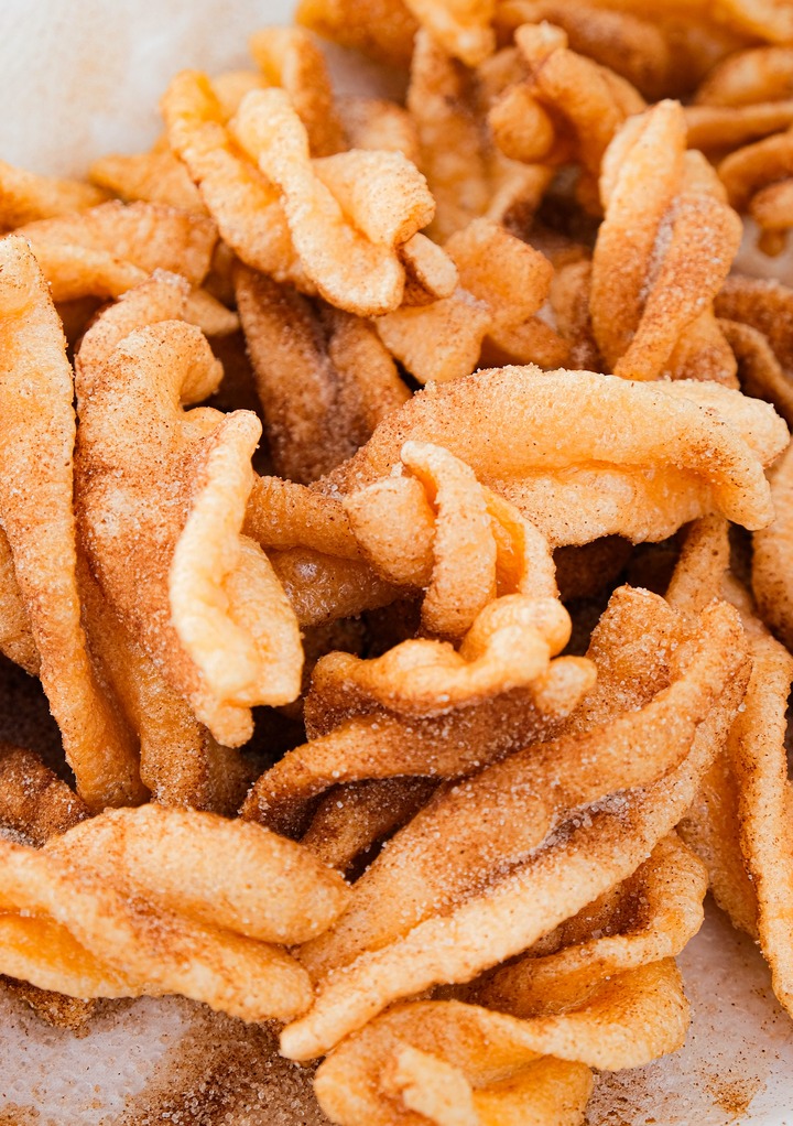 Close view of Taco Bell Cinnamon Twists with cinnamon sugar mixture. 