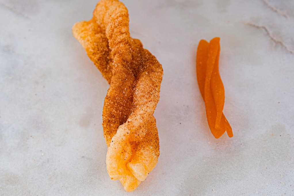 Wheat twist before and after fried to show size difference. 