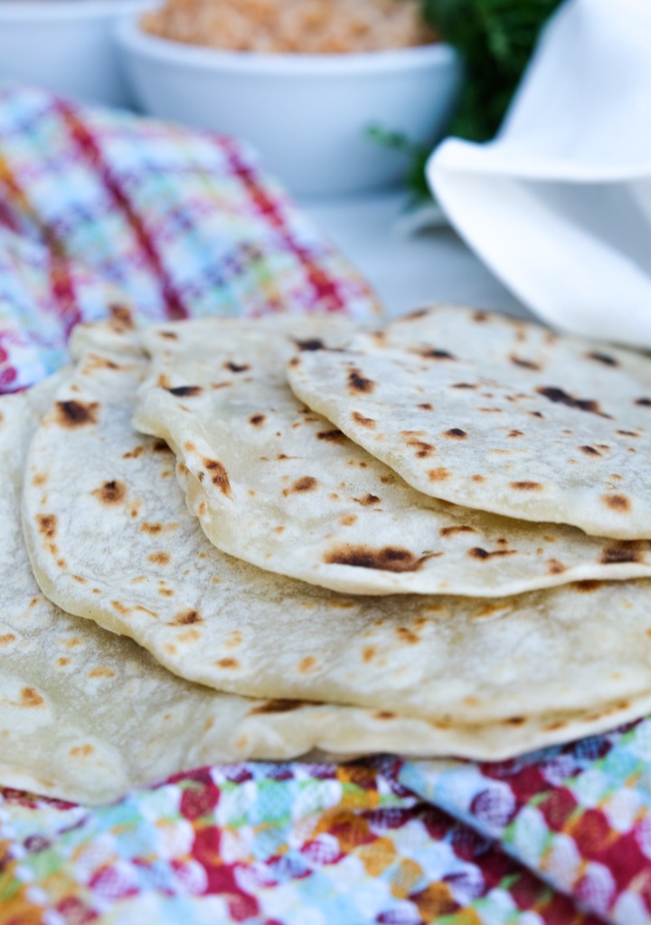 Fresh flour tortilla recipe without lard on a kitchen towel. 